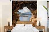 Behang - Fotobehang Water - Grot - Natuur - Landschap - Breedte 165 cm x hoogte 220 cm