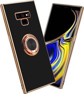 Cadorabo Hoesje geschikt voor Samsung Galaxy NOTE 9 in Glossy Zwart - Goud met ring - Beschermhoes van flexibel TPU-silicone Case Cover met camerabescherming en magnetische autohouder