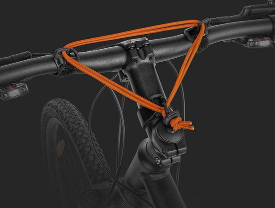 Foto: Carryyygum bagagespanner oranje stuur spanband spinner sterk strong spanriem bagagespannet expander op reis bikepacking