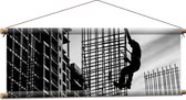 WallClassics - Textielposter - Man op constructie - Zwart Wit - 90x30 cm Foto op Textiel
