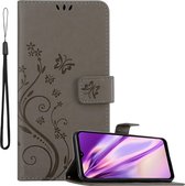 Cadorabo Hoesje geschikt voor Samsung Galaxy A12 / M12 in BLOEMEN GRIJS - Beschermhoes in bloemmotief met magnetische sluiting, standfunctie en kaartsleuven Book Case Cover Etui