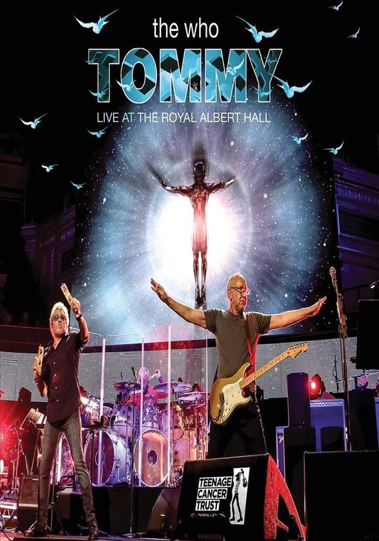 The Who: Tommy Live at the Royal Albert Hall. Twee mannen met instrumenten op podium, achter hen een figuur aan een kruis, omringd door vogels.