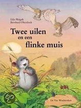 Twee uilen en een flinke muis