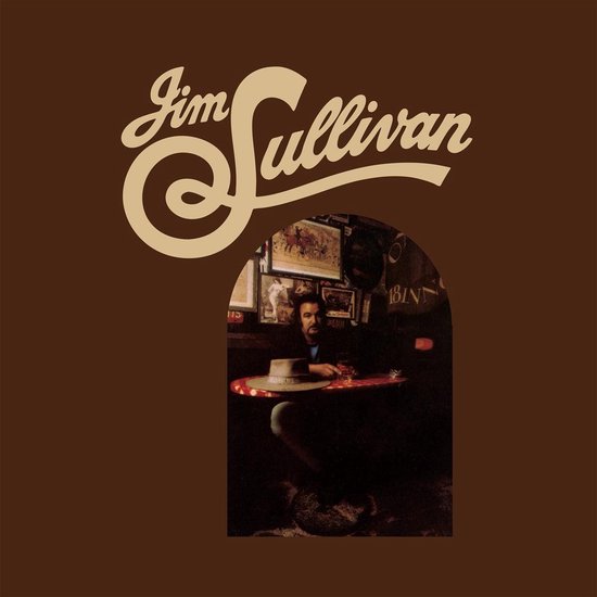 Pochette d'album avec le texte 'Jim Sullivan' et un homme avec un chapeau assis à une table.