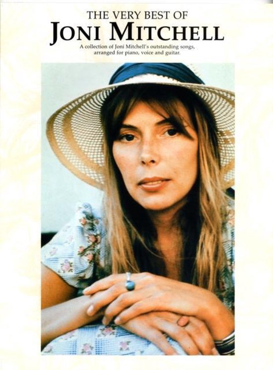 Close-up van Joni Mitchell met een strooien hoed en bloemenjurk.