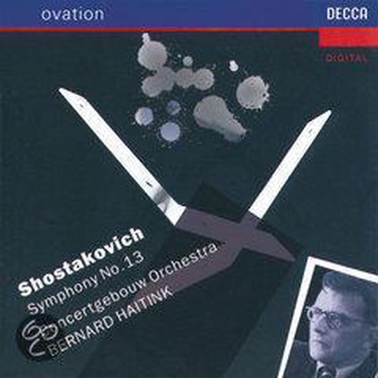 Albumhoes met abstracte rode en witte verfspatten op een zwart vlak, met tekst voor Shostakovich Symphony No. 13.