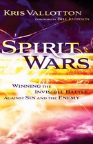 Boekomslag met 'SPIRIT WARS' in grote letters, onder 'Kris Vallotton'. Achtergrond met explosieve lichteffecten.