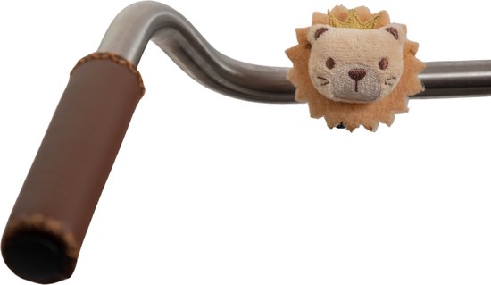 Bruine fietsgreep met een stoffen leeuwenkopje met gouden kroontje erop.
