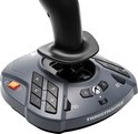 Grijze joystick basis met oranje knoppen en een zwarte joystick. Dichtbij opname van de knoppen.