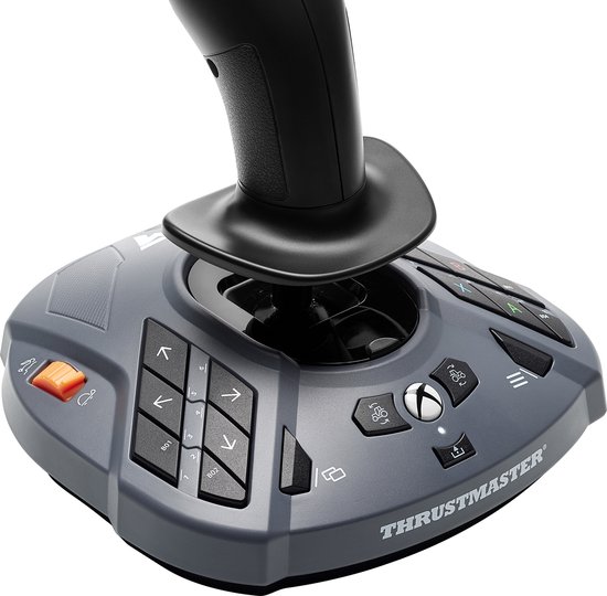 Grijze joystick basis met oranje knoppen en een zwarte joystick. Dichtbij opname van de knoppen.