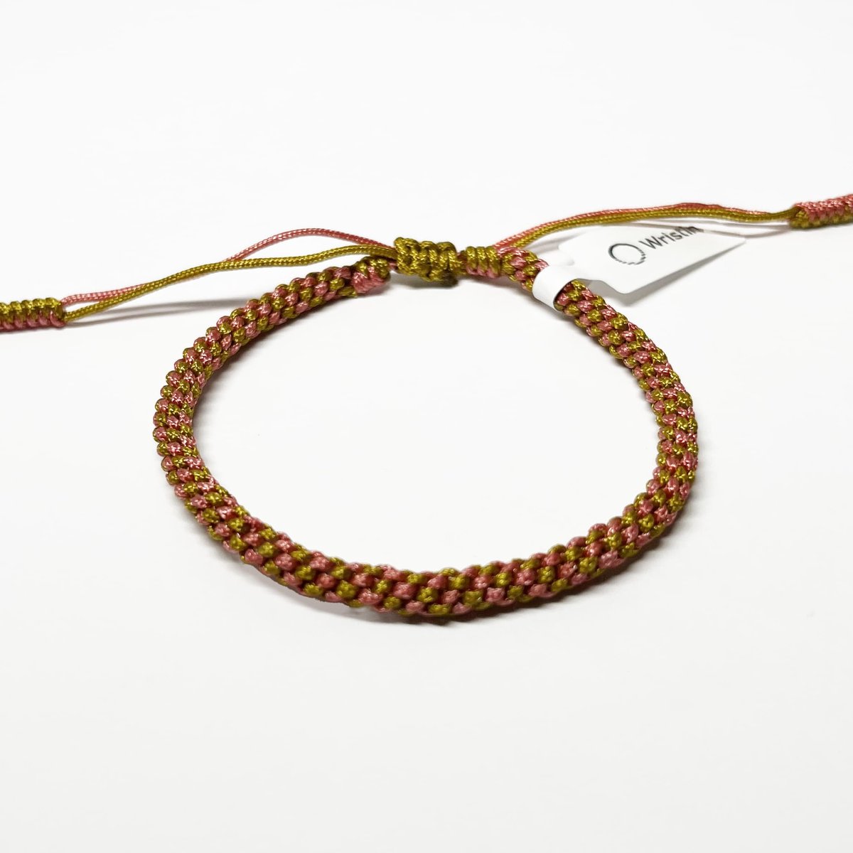 Wristin - Tibetaanse armband geweven roze/goud