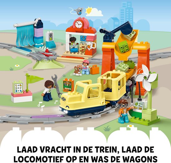 LEGO Duplo trein met gele locomotief, wagon, oranje kraan en stations.