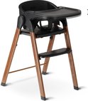 Chaise haute Deryan noire avec pieds aspect bois, avec illustration de la hauteur réglable.