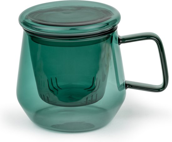 Tasse à thé verte en verre avec couvercle et filtre à thé en verre à l'intérieur.