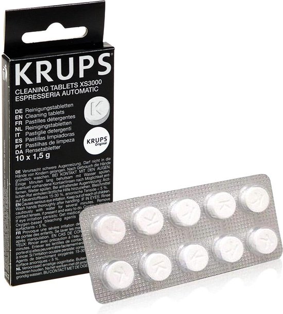 Verpakking en strip met 10 Krups reinigingstabletten voor espressomachines.