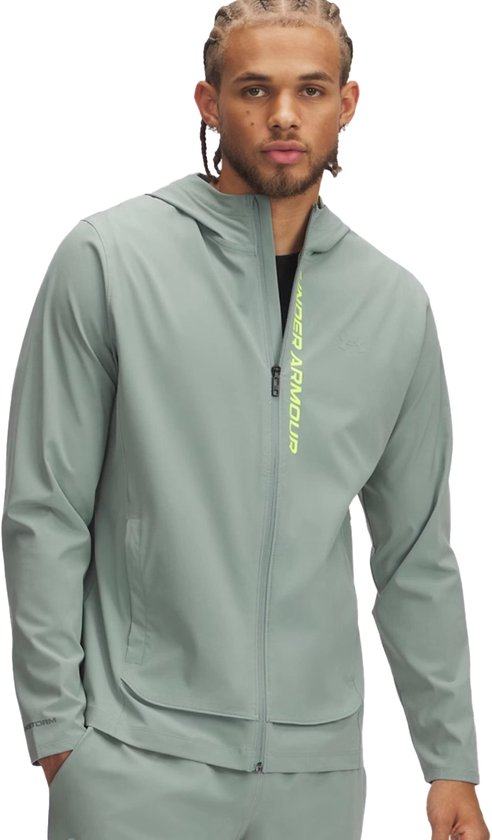 Veste Under Armour Outrun the Storm en vert.