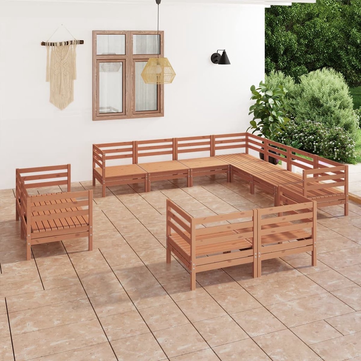 Massief grenenhouten loungeset in honingbruine kleur voor buitenontspanning.