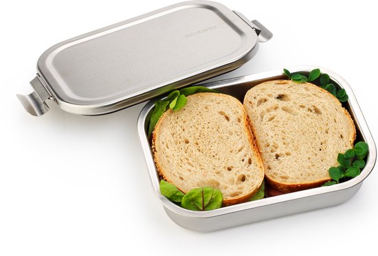 Boîte à lunch Brabantia en inox avec deux tranches de pain et garniture.