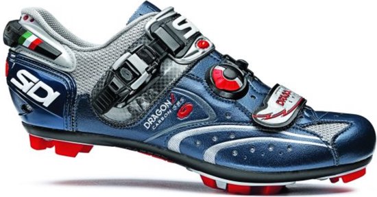 Blauwe Sidi Dragon 2 mountainbikeschoen met rode accenten en witte klittenbandsluiting.