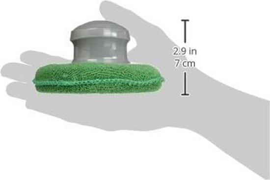 Hand met een groene Turtle Wax poets- en waxpad met grijze handgreep.