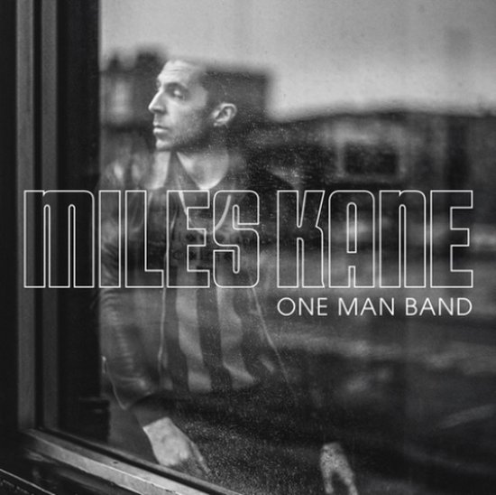 Miles Kane albumhoes met tekst 'Miles Kane One Man Band'.
