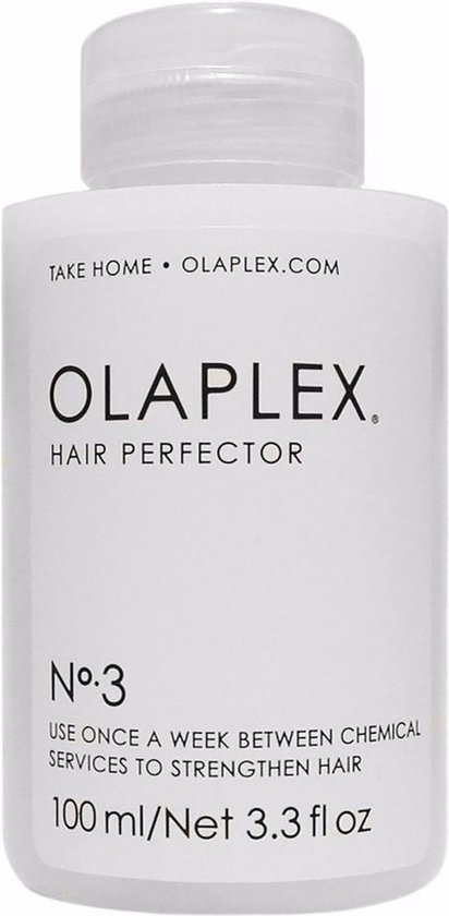 Witte fles Olaplex Hair Perfector No.3 met fliptopdop. Tekst op de fles: 'TAKE HOME OLAPLEX.COM THE ORIGINAL OLAPLEX HAIR PERFECTOR N°.3 USE ONCE A WEEK BETWEEN CHEMICAL SERVICES TO STRENGTHEN HAIR'.
