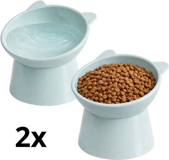 Set van twee lichtblauwe kattenbakken met oor-details, één gevuld met water en één met brokjes. Tekst: '2x'.