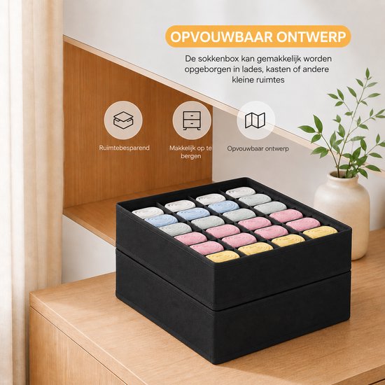 Zwarte opvouwbare organizer met 24 vakken, gevuld met gevouwen sokken in pastelkleuren.