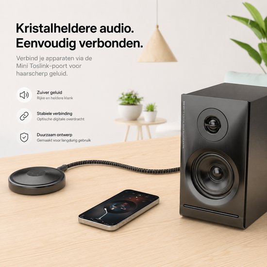 Zwarte luidspreker, telefoon en ronde adapter met kabel. "Kristalheldere audio. Eenvoudig verbonden."