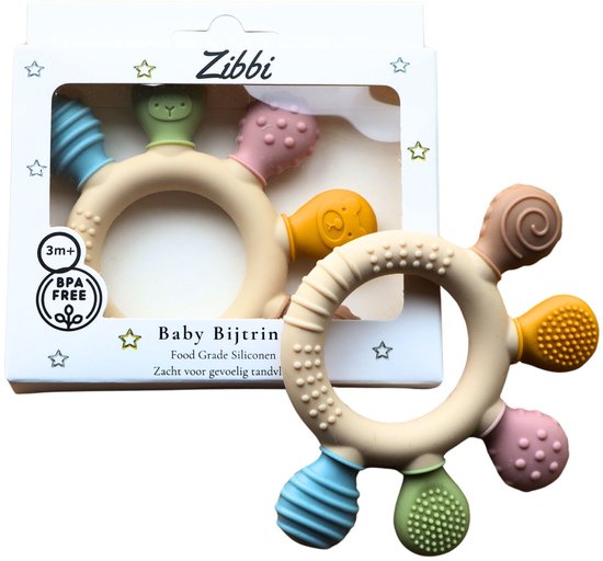 Zibbi baby bijtring in verpakking. Beige ring met gekleurde uiteinden, '100% BPA-vrij' en 'Zacht & veilig'.