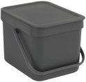 Boîte à compost Brabantia gris foncé avec couvercle et poignée de transport.