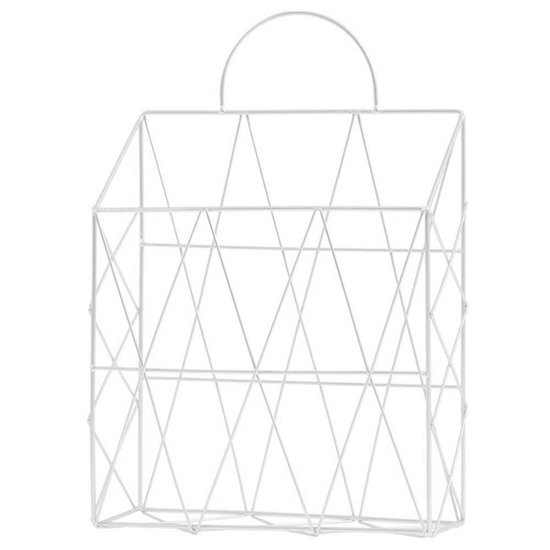 Wit metalen tijdschriftenrek met een geometrisch patroon en handvat.