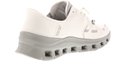 Zijaanzicht van naturel Skechers Glide-Step Pro instapper met dikke grijze zool met openingen.