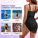 Maillot de bain noir avec mesh et jupe à volants, idéal pour la piscine, la plage et les vacances.