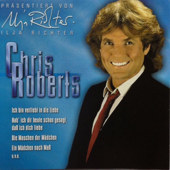 Chris Roberts met Illja Richter. Blauwe achtergrond met tekst "Ich bin verliebt in die Liebe".