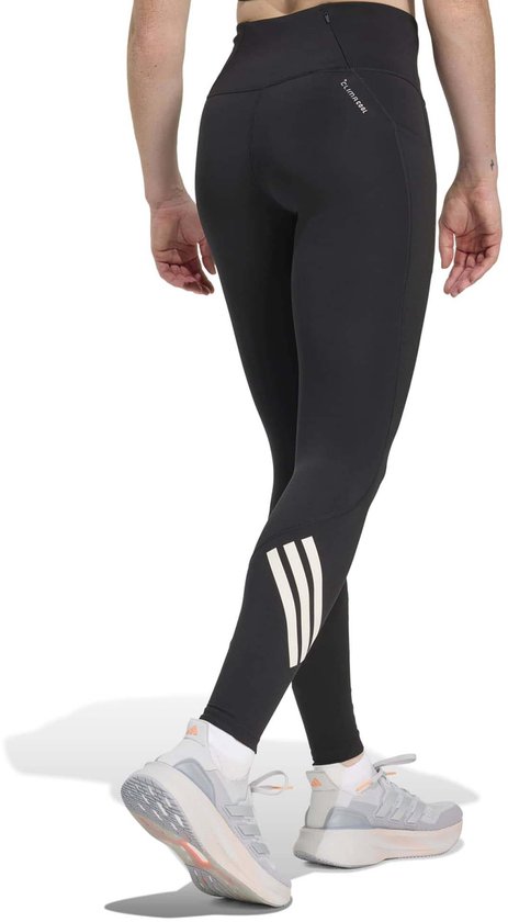 Zwarte dames legging met reflecterende strepen op de kuit en 'ClimaCool' opdruk.