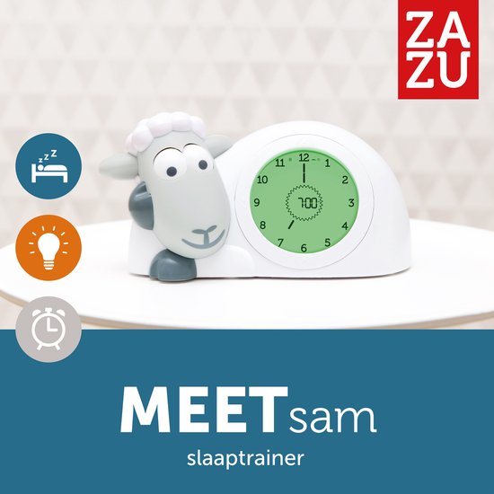 De grijze ZAZU slaaptrainer met de tekst 'MEET sam slaaptrainer'. De klok is groen en toont 7:00.