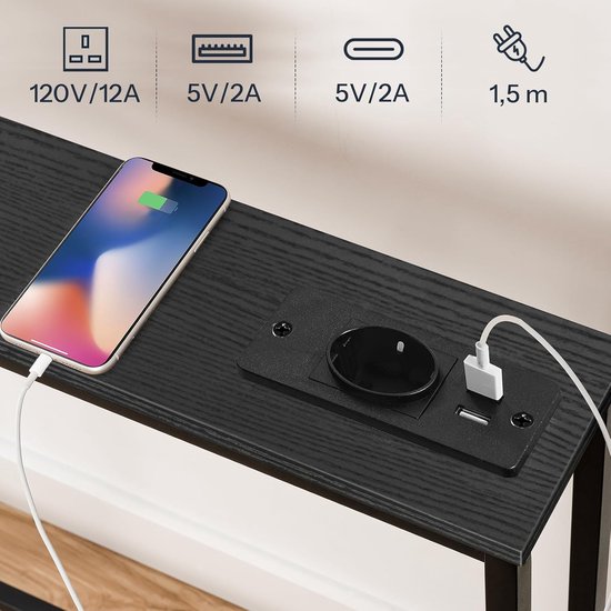 Zwarte consoletafel met stekkerdoos, met iPhone X die oplaadt via USB-C en een USB-A poort.