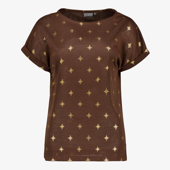 Bruine top met korte, omgeslagen mouwen en een all-over goudkleurige sterrenprint.