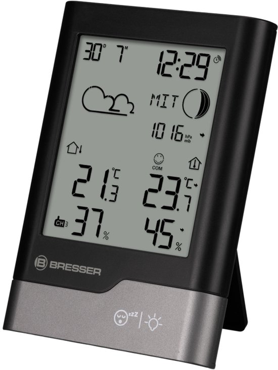 Zwarte Bresser weerstation met grijze basis, toont temperatuur, luchtvochtigheid, tijd en weersvoorspelling.