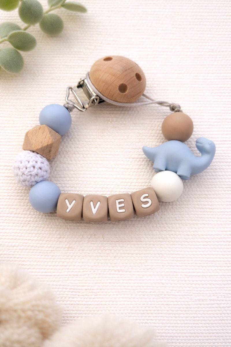 Gepersonaliseerd speenkoord met naam | dino blauw en beige |verzending binnen 24h | kraamcadeau & geboortecadeau | baby | speenketting