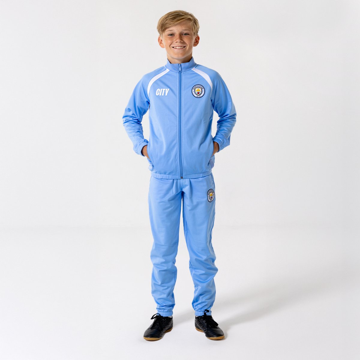 Manchester City Trainingspak Kinderen 25/26 - Maat 116 t/m 164 - Sportkleding - Jongens & Meisjes - Blauw - Voetbakleding - Officiële Manchester City Fanmerchandise