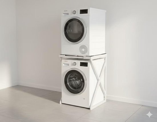 Wit wasmachine-opbouwmeubel met een droger erop gestapeld.