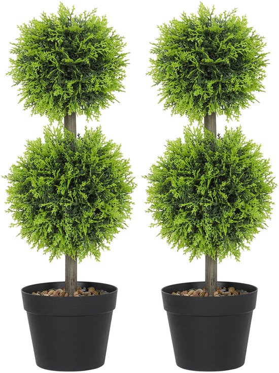 Vier groene kunst planten met twee ronde bladeren op een stam, in zwarte potten.
