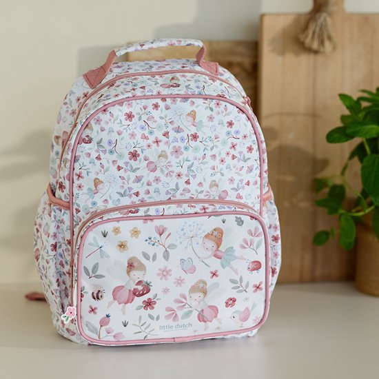 Sac à dos rose avec imprimé floral et de fées. Poche avant avec fées, coccinelle, abeille et libellule.