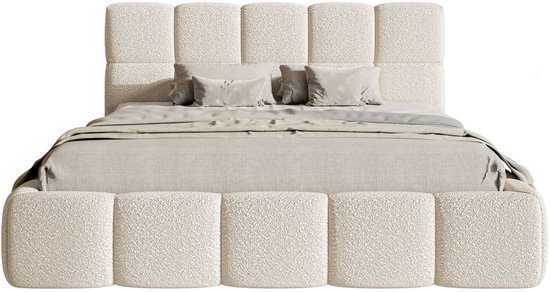 Lit rembourré 180x200 cm, bouclé beige clair, avec tête de lit rembourrée et coussins.