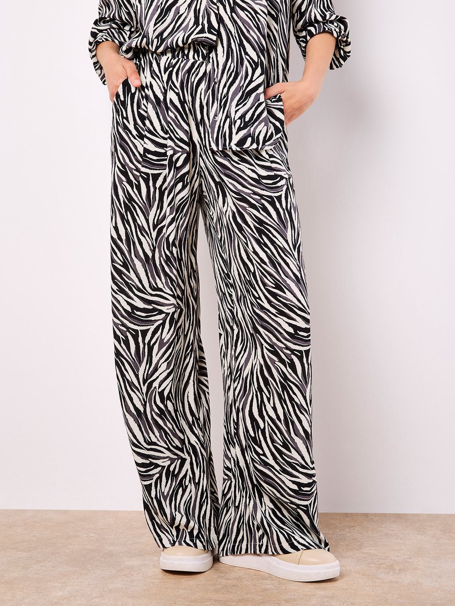 Broek met zebraprint en wijde pijpen