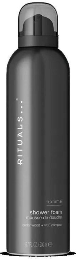 Rituals Homme doucheschuim in een donkergrijze spuitbus met witte tekst: "RITUALS... homme shower foam mousse de douche cedar wood + vit E complex 1.6 FL. OZ. / 50 ml e".