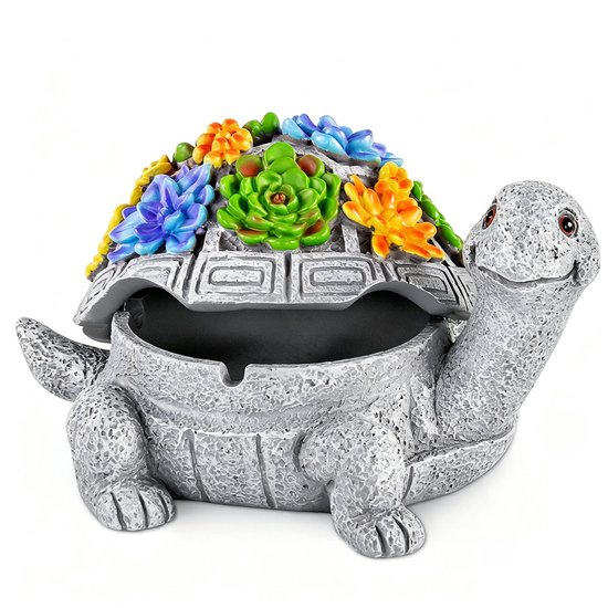 Een grijze schildpad asbak met een open schild, versierd met kleurrijke kunstsucculenten in groen, blauw, oranje en geel.