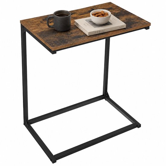Table d'appoint avec plateau aspect bois et cadre en métal noir, avec une tasse, un livre et un bol d'amandes dessus.